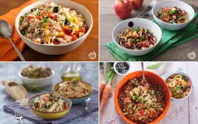 Quattro ciotole di colorata insalata di riso, con ingredienti freschi e vivaci, perfette per un pasto estivo.