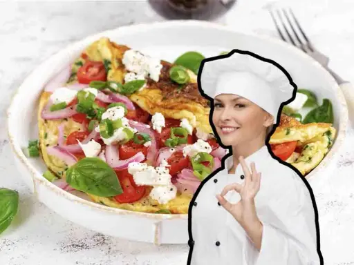 Chef sorridente mostra una deliziosa frittata di cipolle, pomodori e formaggio feta, guarnita con basilico fresco.