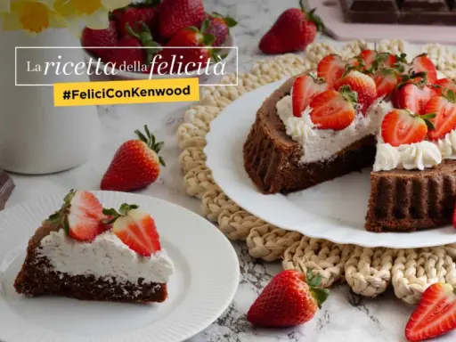 Una crostata morbida al cioccolato, guarnita con panna e fragole fresche, è la ricetta della felicità.